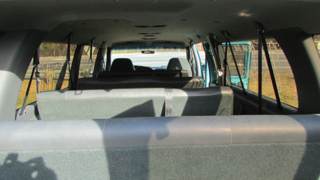 1994 Teal Ford E-Series Van 15 Passenger Van