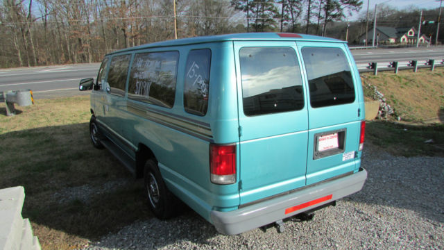 1994 Teal Ford E-Series Van 15 Passenger Van