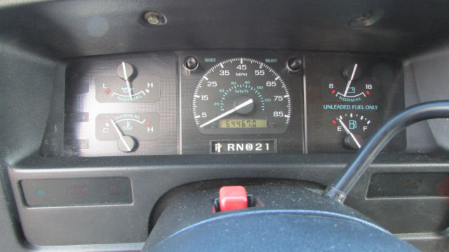 1994 Teal Ford E-Series Van 15 Passenger Van