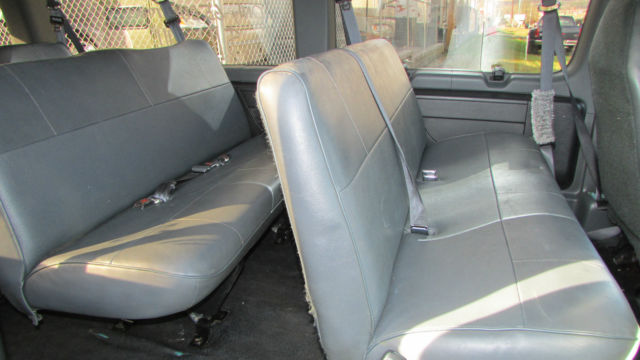 1994 Teal Ford E-Series Van 15 Passenger Van