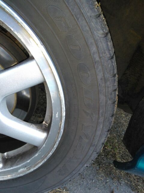 1994 Green Ford Escort Coupe