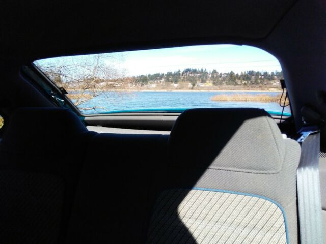 1994 Green Ford Escort Coupe