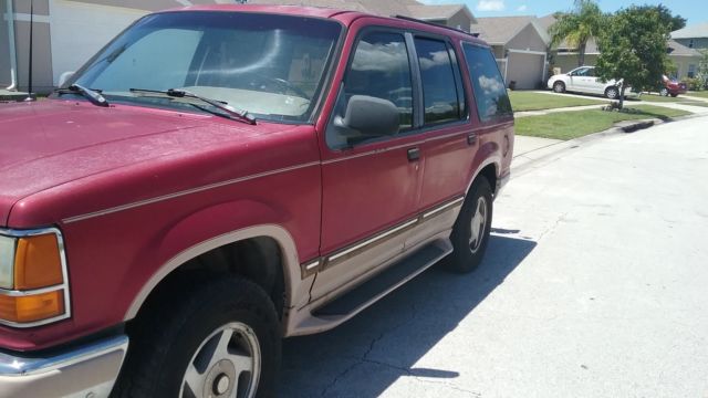 1994 Burgundy Ford Explorer SUV