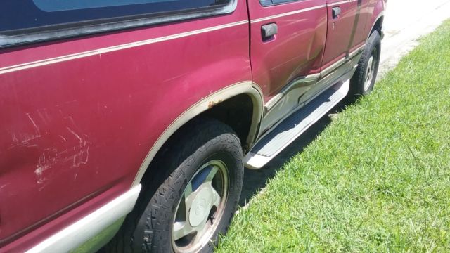 1994 Burgundy Ford Explorer SUV