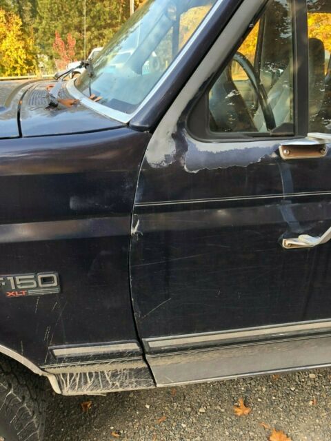 1994 Blue Ford F-150 Extended Cab Pickup