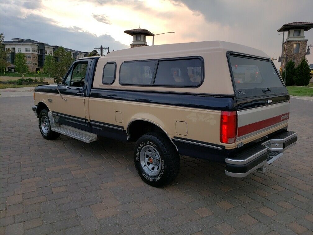 1991 Blue Ford F-150 Standard Cab Pickup
