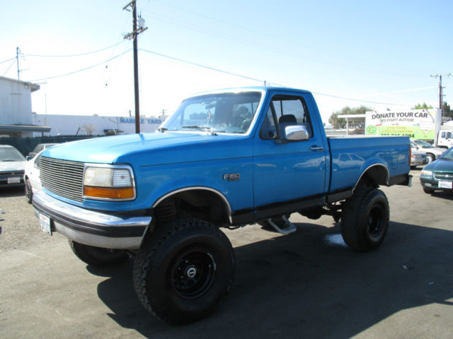 1994 Blue Ford F-150 Standard Cab Pickup