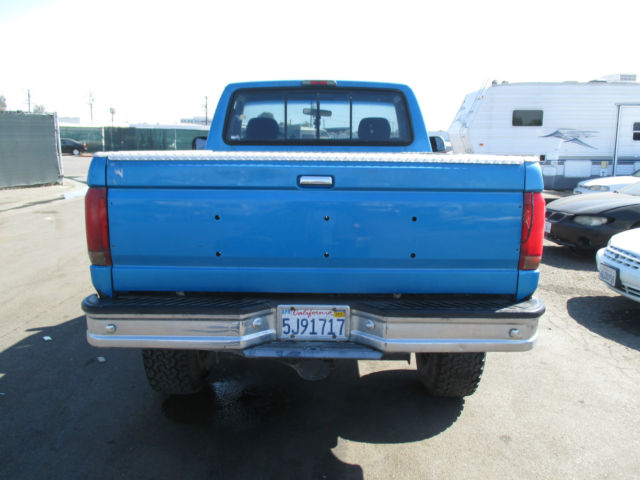 1994 Blue Ford F-150 Standard Cab Pickup