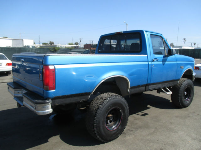 1994 Blue Ford F-150 Standard Cab Pickup