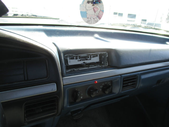 1994 Blue Ford F-150 Standard Cab Pickup