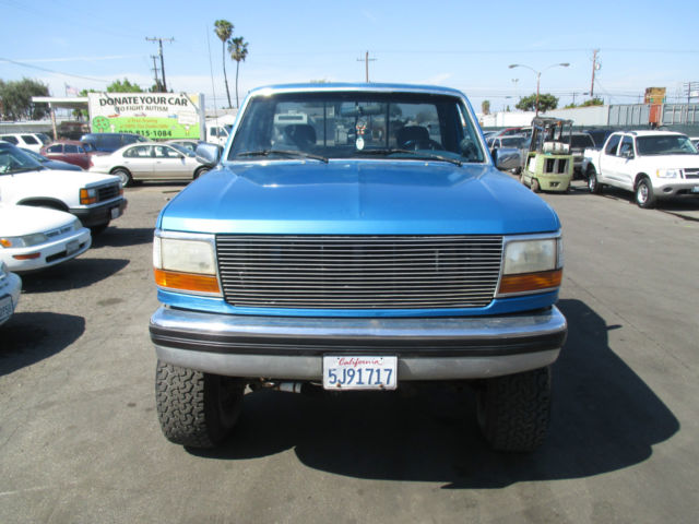 1994 Blue Ford F-150 Standard Cab Pickup