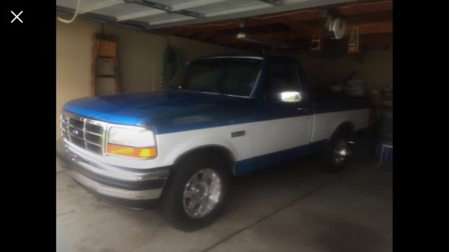 1994 Blue and white Ford F-150 Standard Cab Pickup