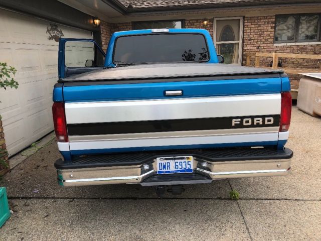 1994 Blue and white Ford F-150 Standard Cab Pickup