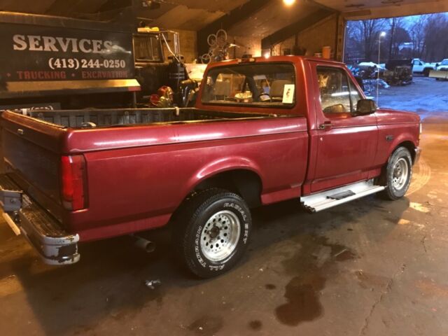1994 Red Ford F-150 Standard Cab Pickup