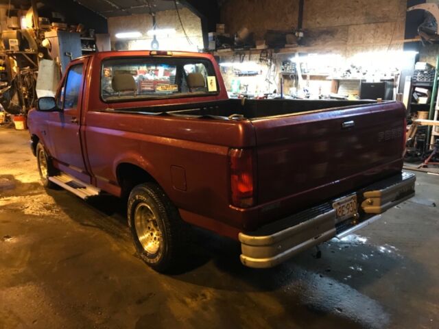 1994 Red Ford F-150 Standard Cab Pickup