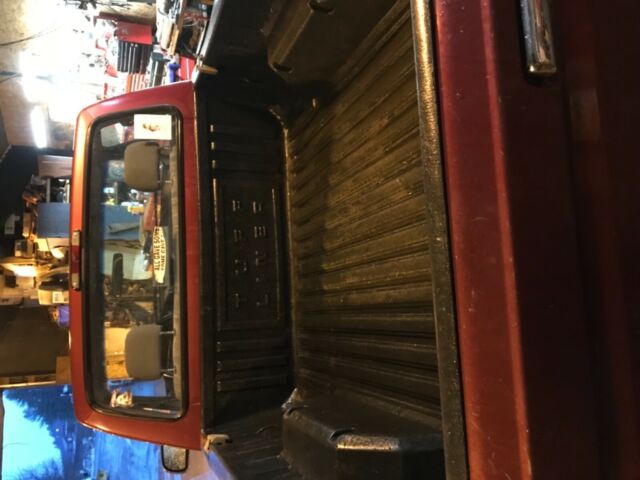 1994 Red Ford F-150 Standard Cab Pickup