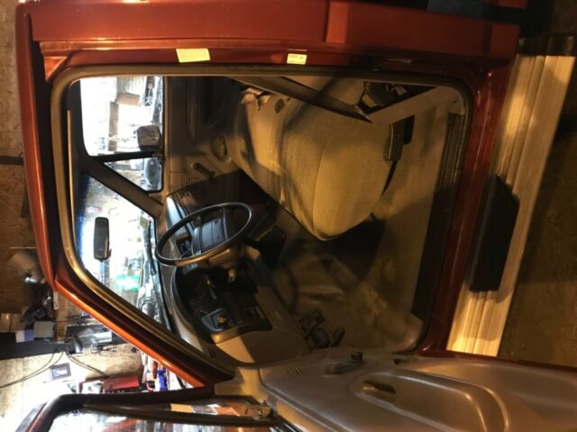 1994 Red Ford F-150 Standard Cab Pickup