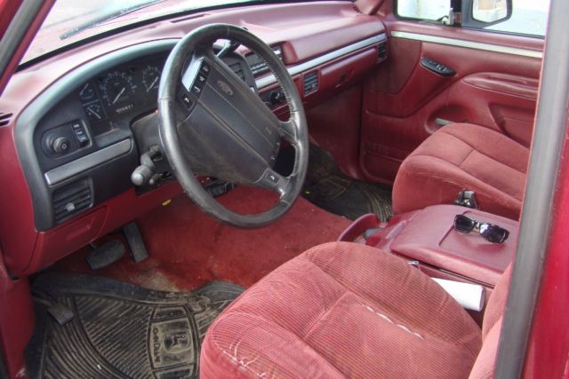 1994 Black and Red Ford F-150 Extended Cab Pickup