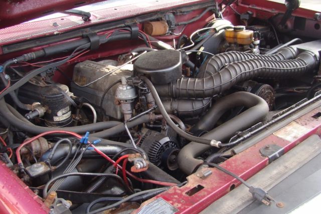 1994 Black and Red Ford F-150 Extended Cab Pickup