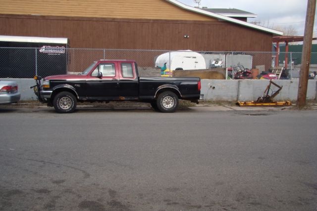 1994 Black and Red Ford F-150 Extended Cab Pickup
