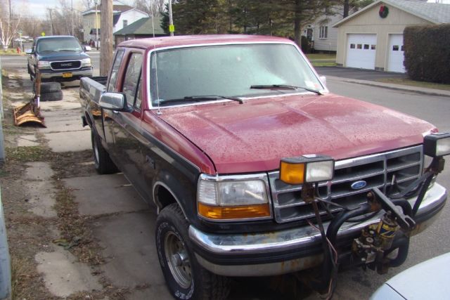 1994 Black and Red Ford F-150 Extended Cab Pickup