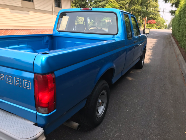 1994 Blue Ford F-150 Extended Cab Pickup