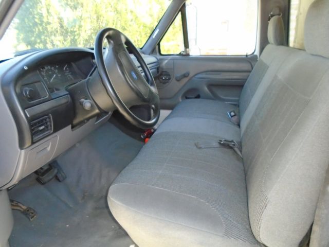 1994 white/orange Ford F-350 van