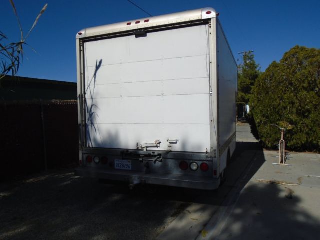 1994 white/orange Ford F-350 van