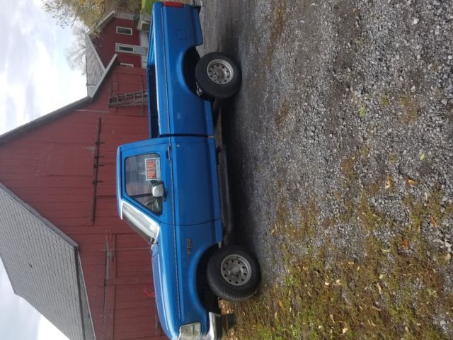 1994 Blue Ford F-150 Extended Cab Pickup