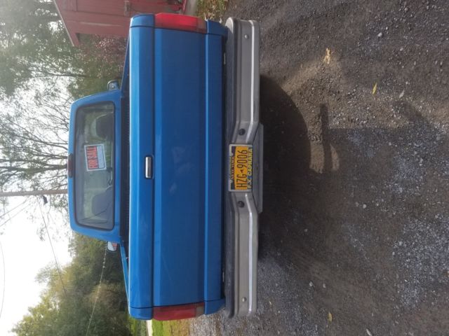 1994 Blue Ford F-150 Extended Cab Pickup