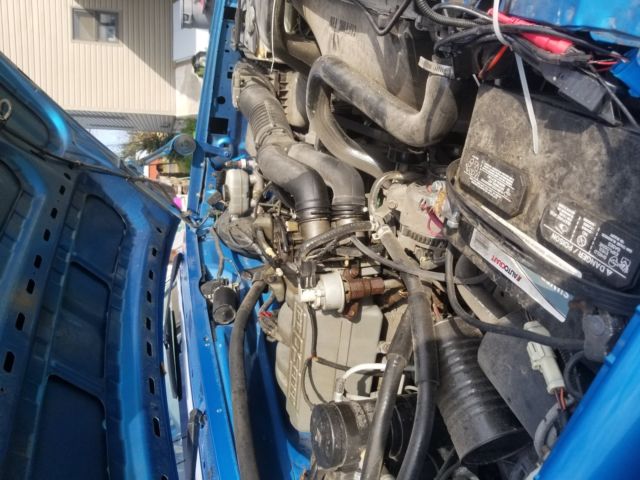 1994 Blue Ford F-150 Extended Cab Pickup