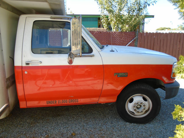 1994 Orange Ford F-350 box van