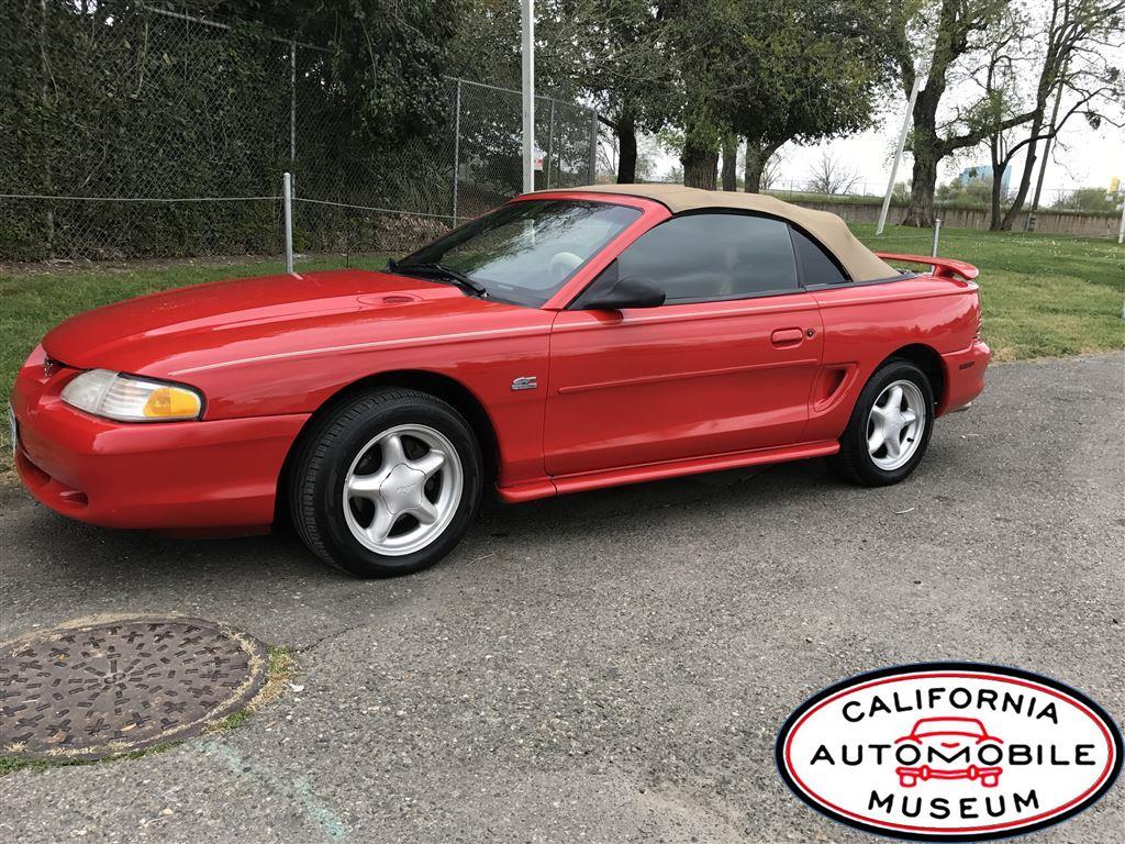 1994 Red Ford Mustang --