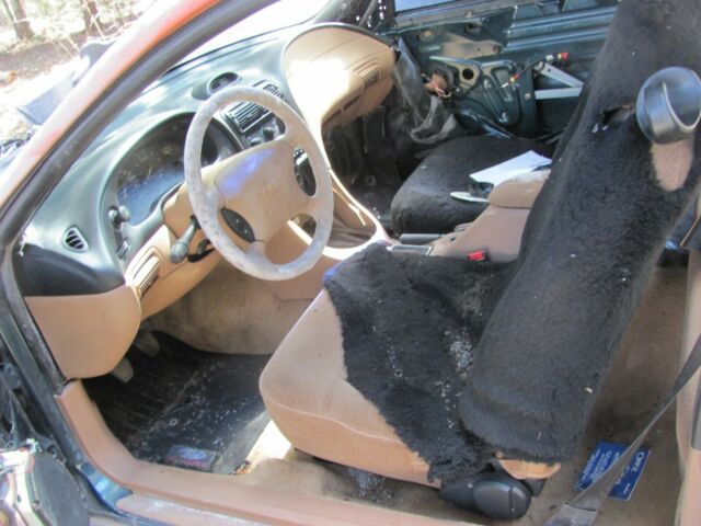 1994 Brown Ford Mustang Coupe