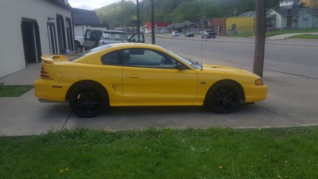 1994 Yellow Ford Mustang Coupe