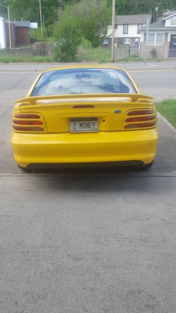 1994 Yellow Ford Mustang Coupe