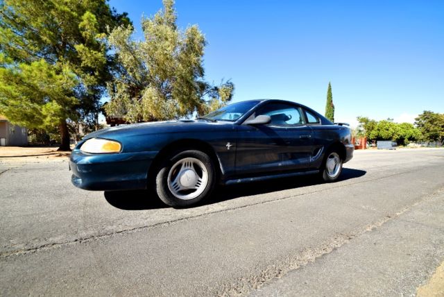1994 Dark Green Ford Mustang