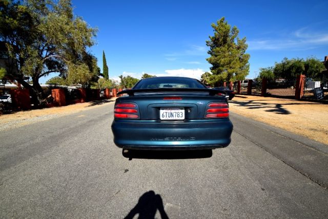 1994 Dark Green Ford Mustang