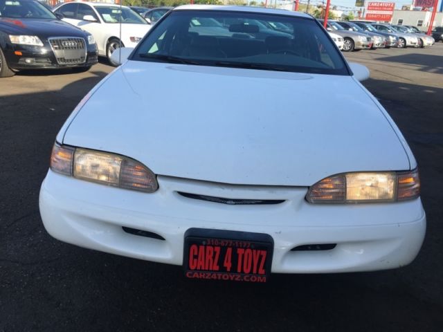 1994 White Ford Thunderbird Coupe