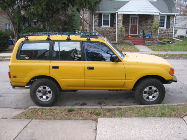 1994 Yellow Toyota Land Cruiser