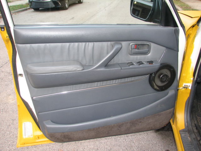 1994 Yellow Toyota Land Cruiser