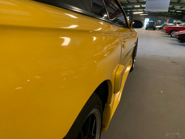 1994 Yellow Ford Mustang Convertible