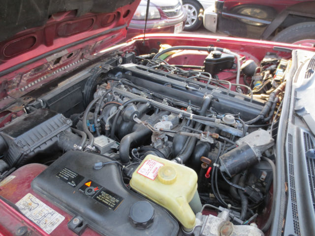 1994 Burgundy Jaguar XJ Sedan