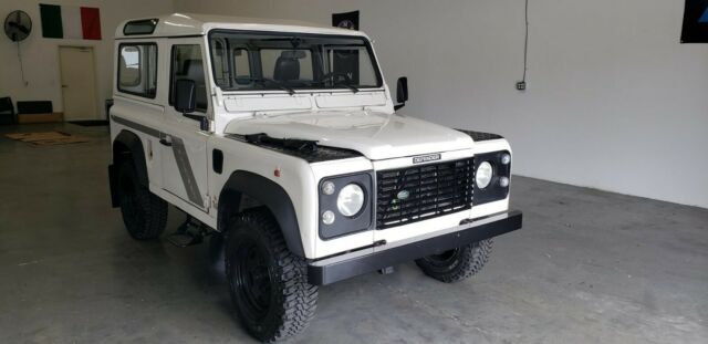 1994 white Land Rover Defender SUV