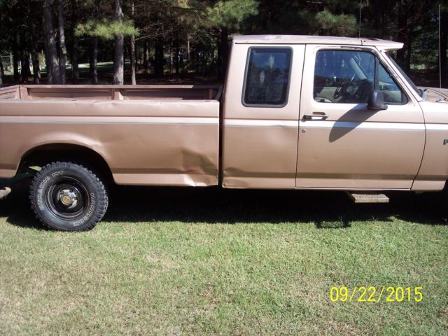 1994 Brown Ford F-150 Extended Cab Pickup