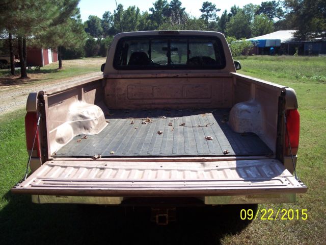 1994 Brown Ford F-150 Extended Cab Pickup