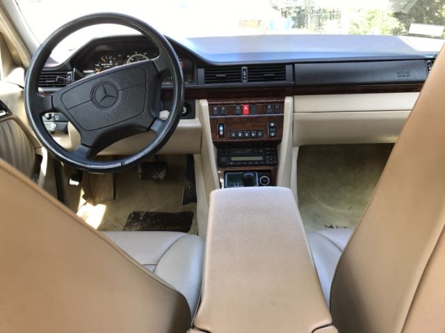 1994 White Mercedes-Benz 400-Series Sedan