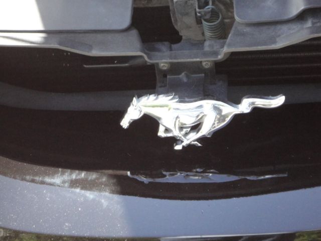 1994 black Ford Mustang sports coupe
