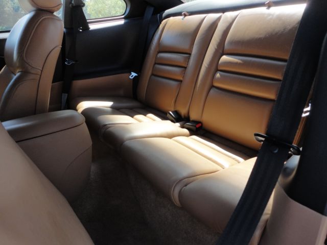 1994 black Ford Mustang sports coupe