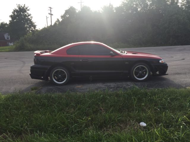 1994 Red over Black with Charcoal pinstripe Ford Mustang